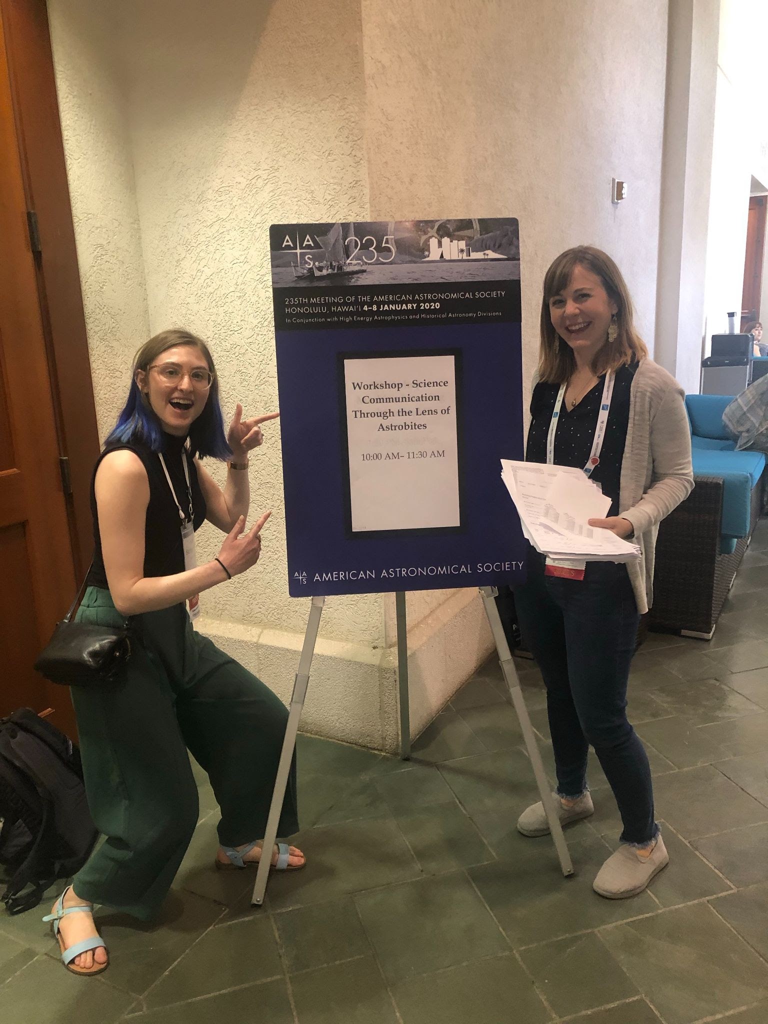 Astrobites workshop leaders Kate Storey-Fisher and Briley Lewis getting ready to present at AAS 235. 