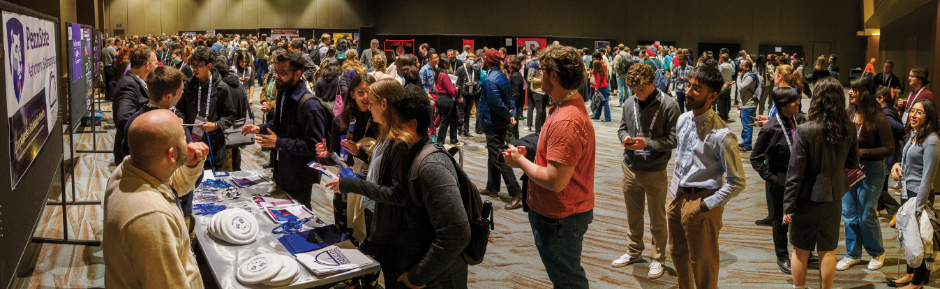 Students gathered at the REU grad fair.