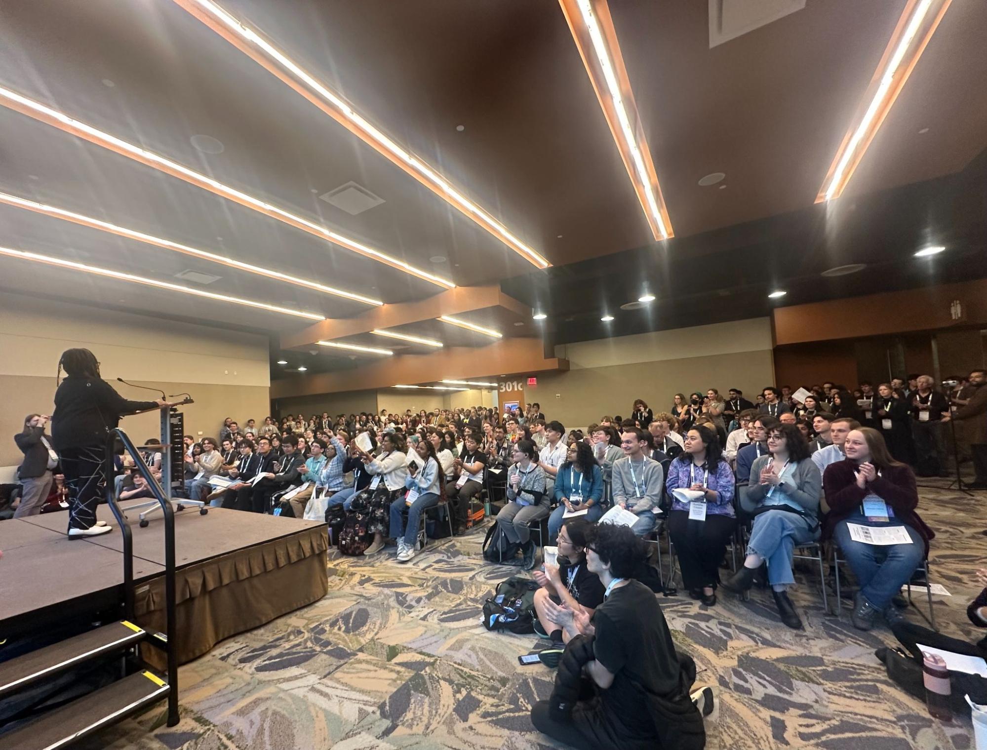 AAS President Dara Norman speaking to a packed room at the First Timers’ Orientation at AAS 247 in Phoenix, AZ.